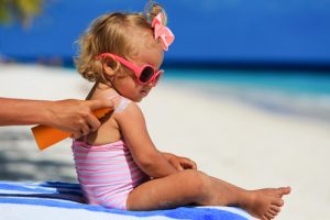 Benefits of Zinc Oxide - Baby wearing sunscreen